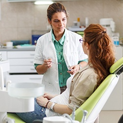 Sedation dentist in Toledo speaking with a patient