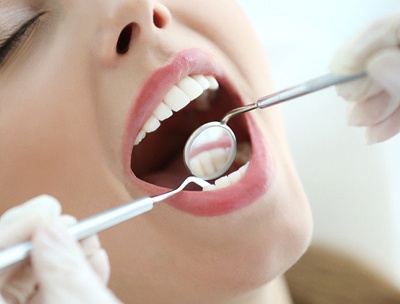 Woman at dental appointment for periodontal therapy.