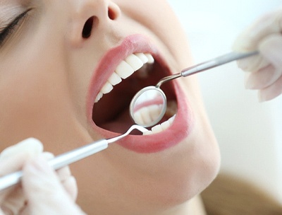 Woman at dental appointment for periodontal therapy.