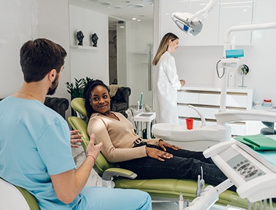 Patient and dentist discussing treatment options