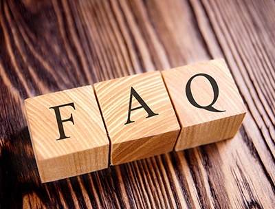 FAQ letter blocks on wooden background