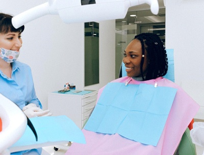 Woman at consultation with cosmetic dentist