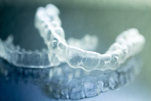 Get your ideal smile with Invisalign in Toledo from Dental Group West – these customized, invisible aligners are the clear winner for straight teeth.  