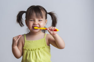 Brushing and flossing can be fun for your child! Your family dentist in Toledo shows you how.