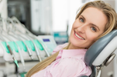 Woman smiling at dentist