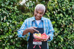 Man with dentures at barbeque