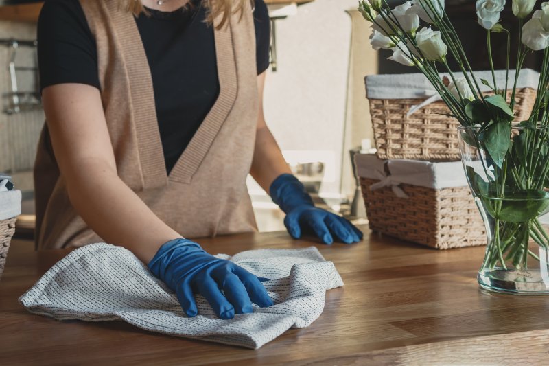 someone cleaning their house in the spring